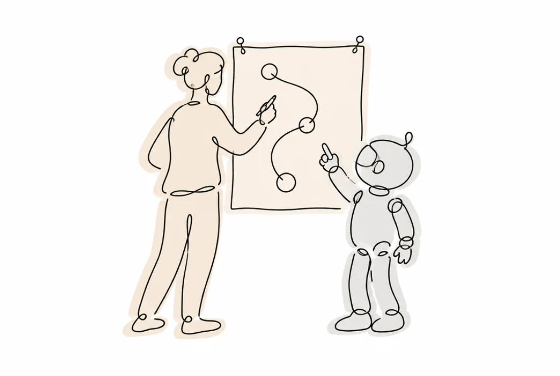 A person and a robot mapping a path together on a wall chart