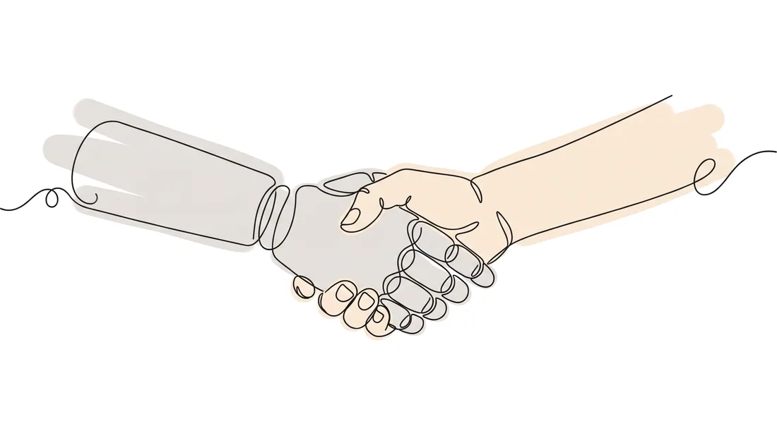 A human hand and a robot hand in a handshake